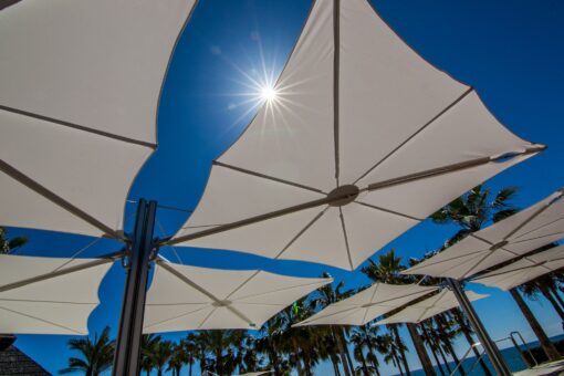 modern umbrella multi cantilever 316 360 contract hotel pool ocean beach club design